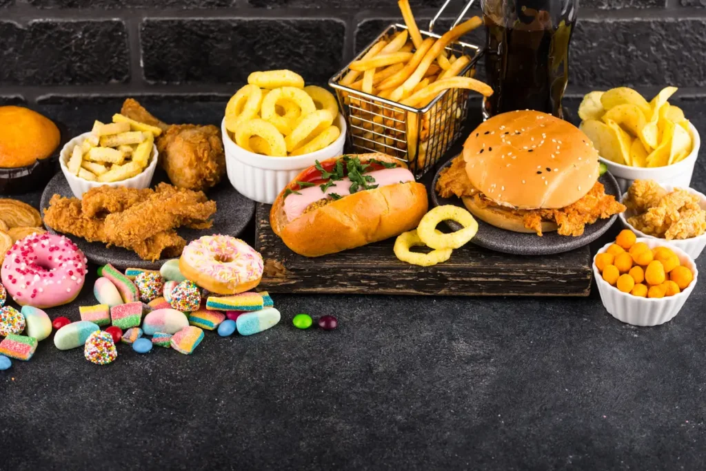 Clínica SOM | comida chatarra - persona obesa